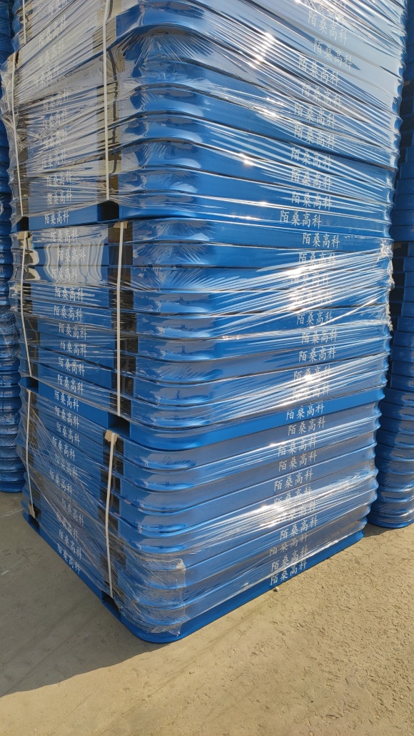 A stack of Derack storage units, wrapped in plastic film.