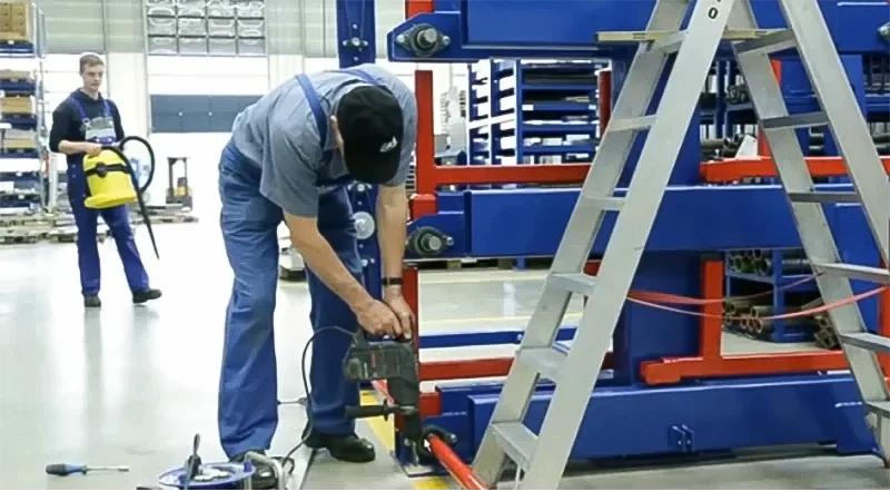 Installation of heavy duty rack base using expansion bolts