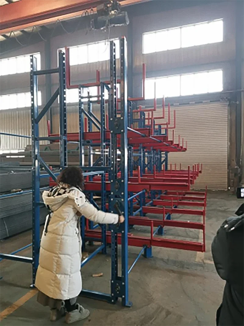 Operator using crank out cantilever rack for bar stock