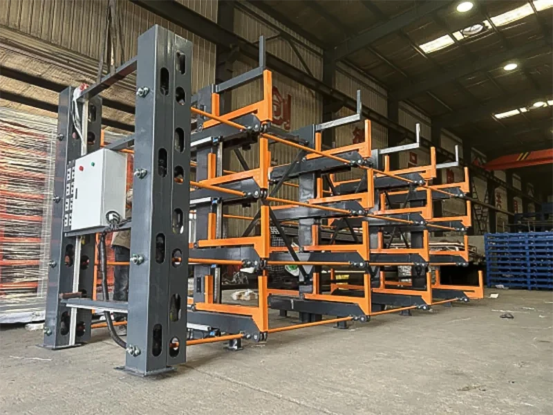 An operator easily uses the manual crank handle to extend a level on the rolling cantilever rack.
