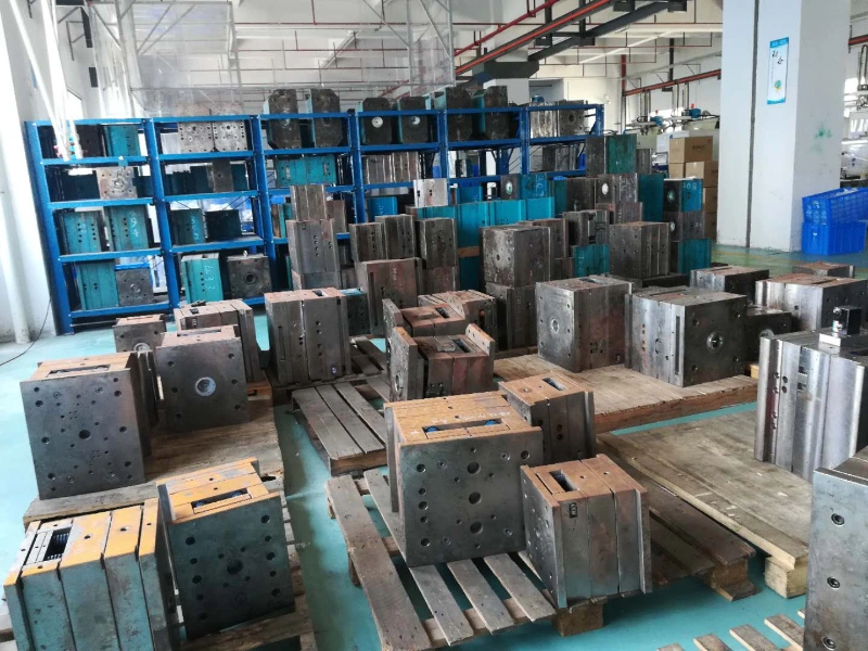 die rack storage showing disorganized molds on the floor